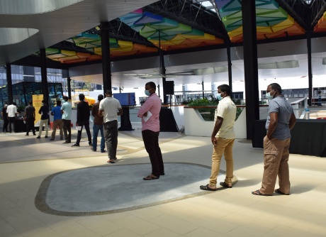 People queuing patiently for their turn to get vaccinated